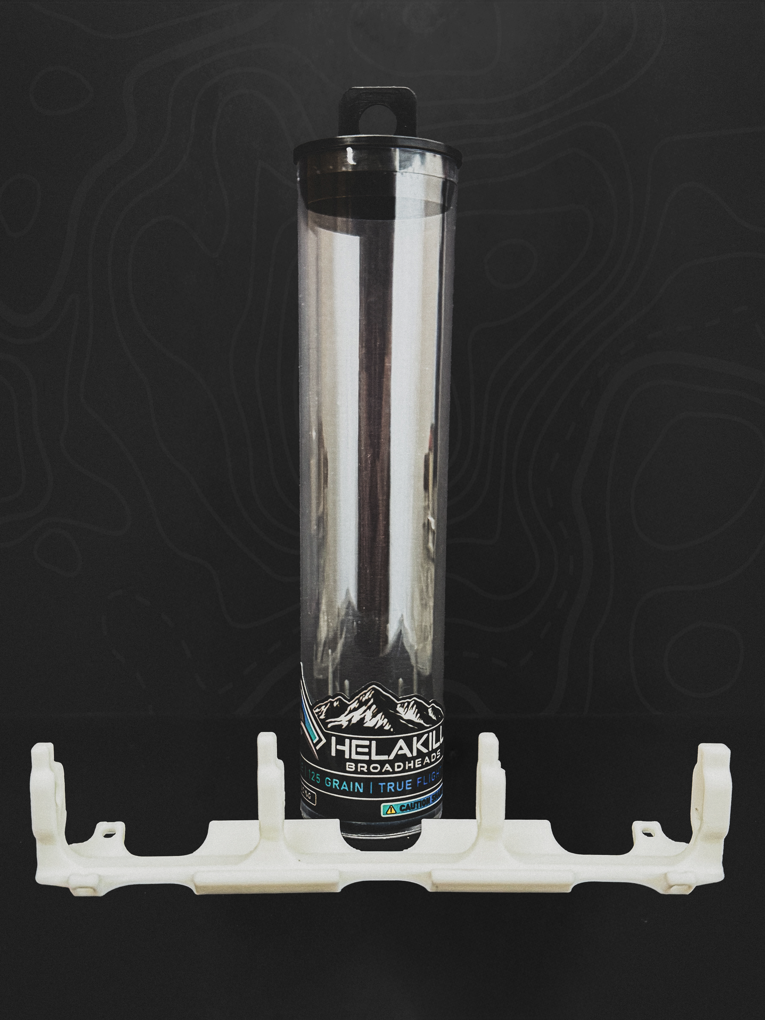 Helakill 125-grain replacement clear storage tube and white internal broadhead holder, shown empty