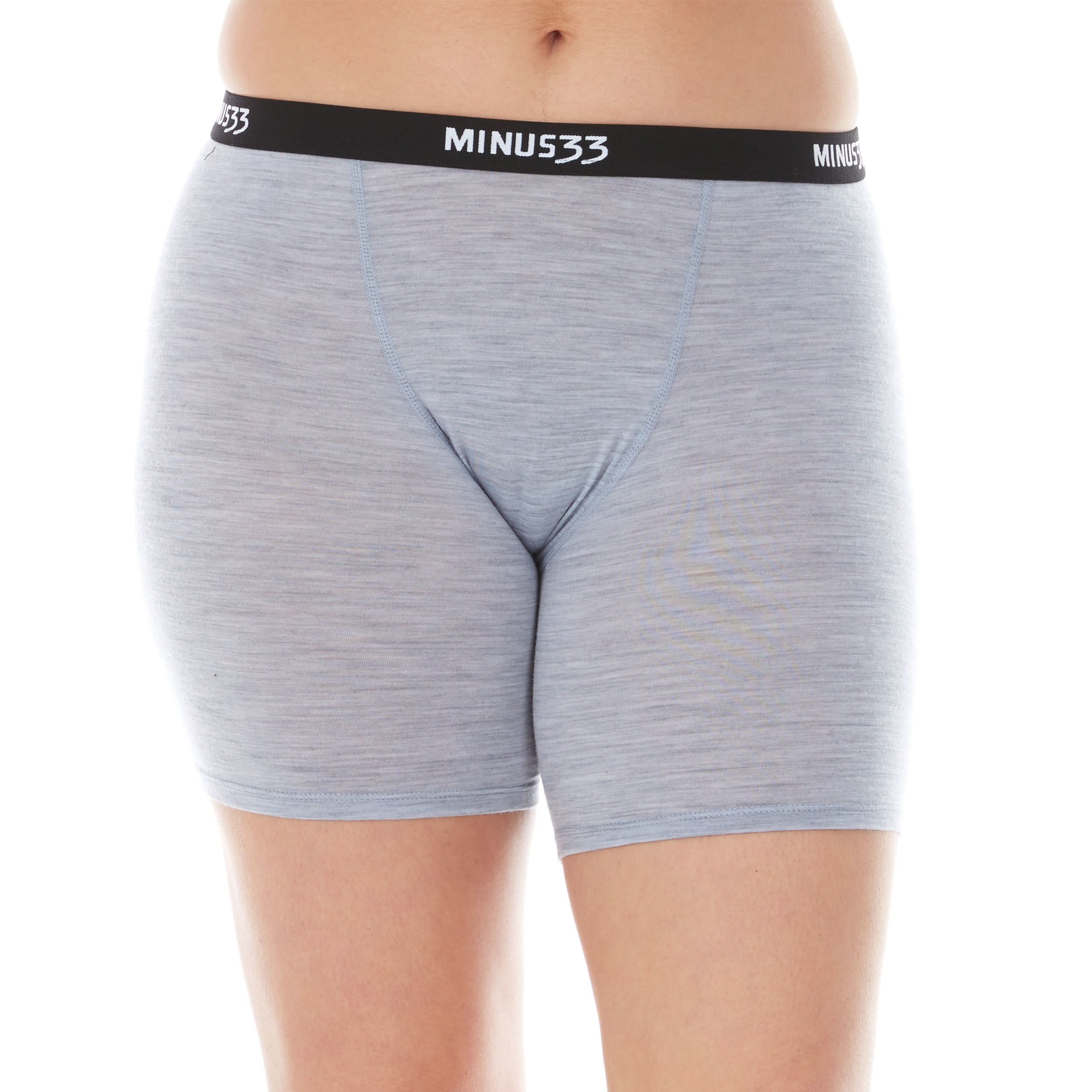 A woman models the microweight merino wool women's boxer briefs. The boxer briefs have a five inch inseam and a one inch woven sport elastic waistband, front view