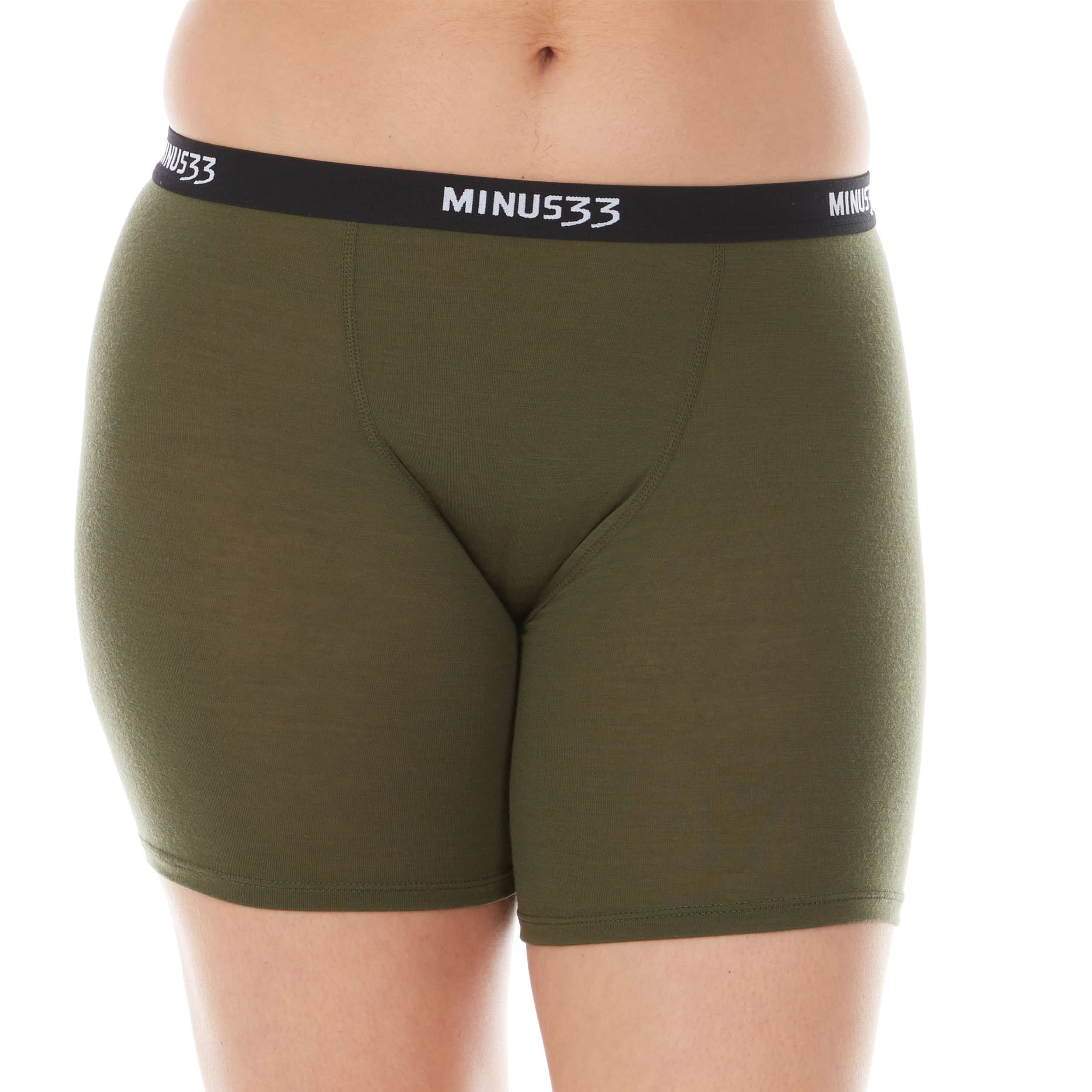 A woman models the microweight merino wool women's boxer briefs. The boxer briefs have a five inch inseam and a one inch woven sport elastic waistband, front view