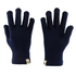 Close up of Minus33 merino wool glove liners in the color navy blue on a white background.