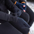 Hands fit lightweight merino glove liners over the wrists