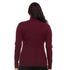 Back view of a woman wearing a burgundy midweight merino wool turtleneck sweater, showing the high collar, straight shoulder seams, long fitted sleeves, gently shaped waist, and even hip-length hem