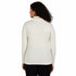 a cream-colored turtleneck sweater and black pants, merino wool