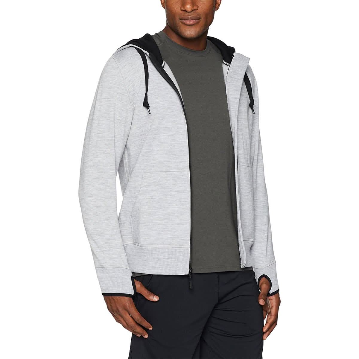 A man models the heavyweight brushed wool Kodiak Fleece Hoodie, crafted with thumbholes and a drawstring to bundle you up for wicked cold days, front view