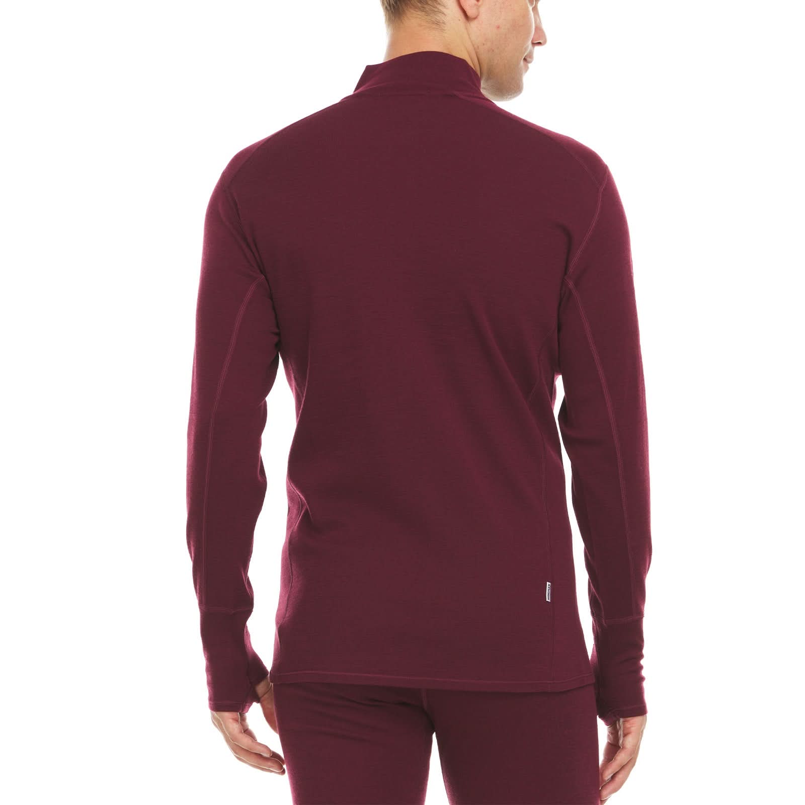 A man models the merino wool midweight quarter zip sweater, complete with flat-lock seams and thumbholes, back view