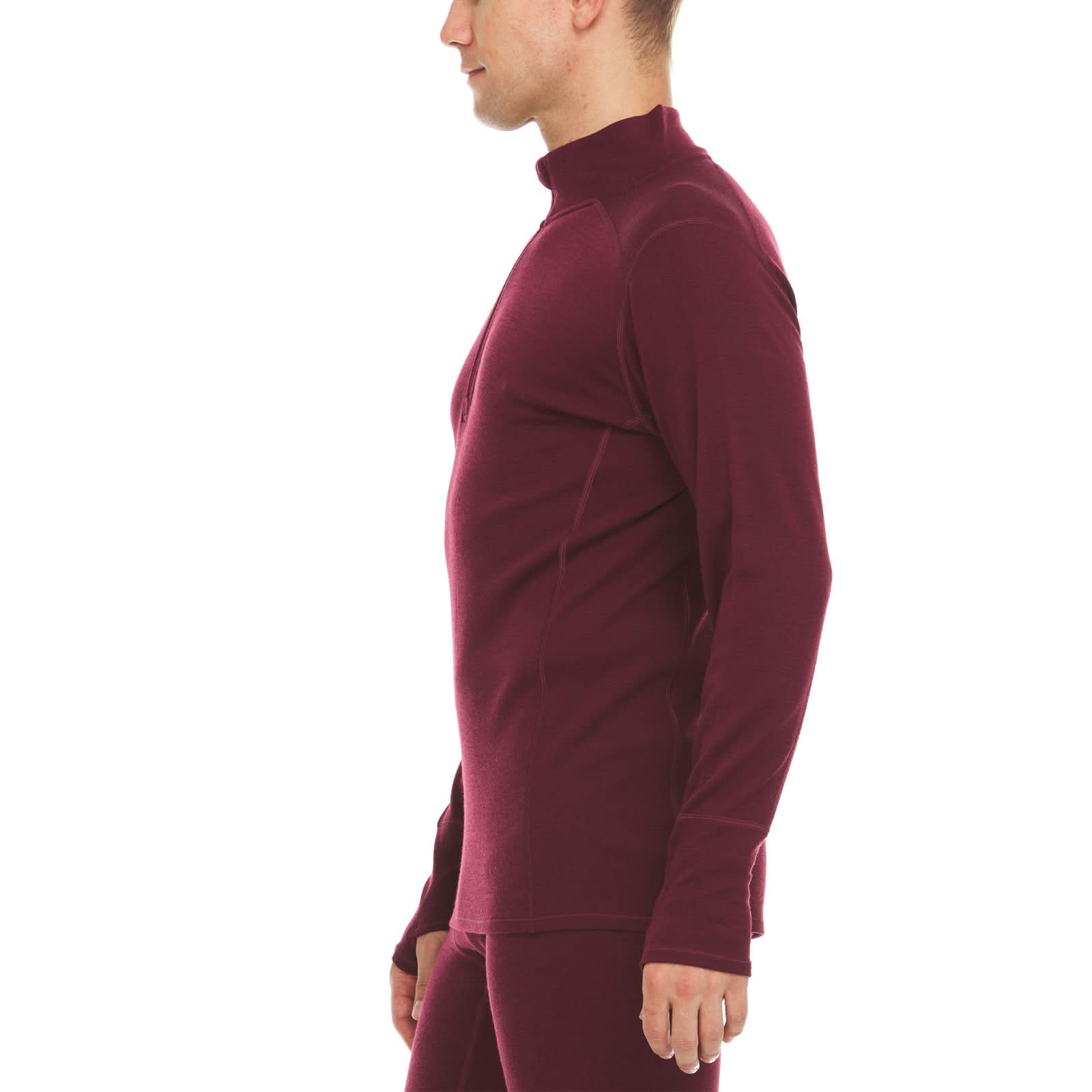 A man models the merino wool midweight quarter zip sweater, complete with flat-lock seams and thumbholes, right-facing side view