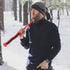 A man models the merino wool midweight quarter zip sweater, complete with flat-lock seams and thumbholes, close-up of the product