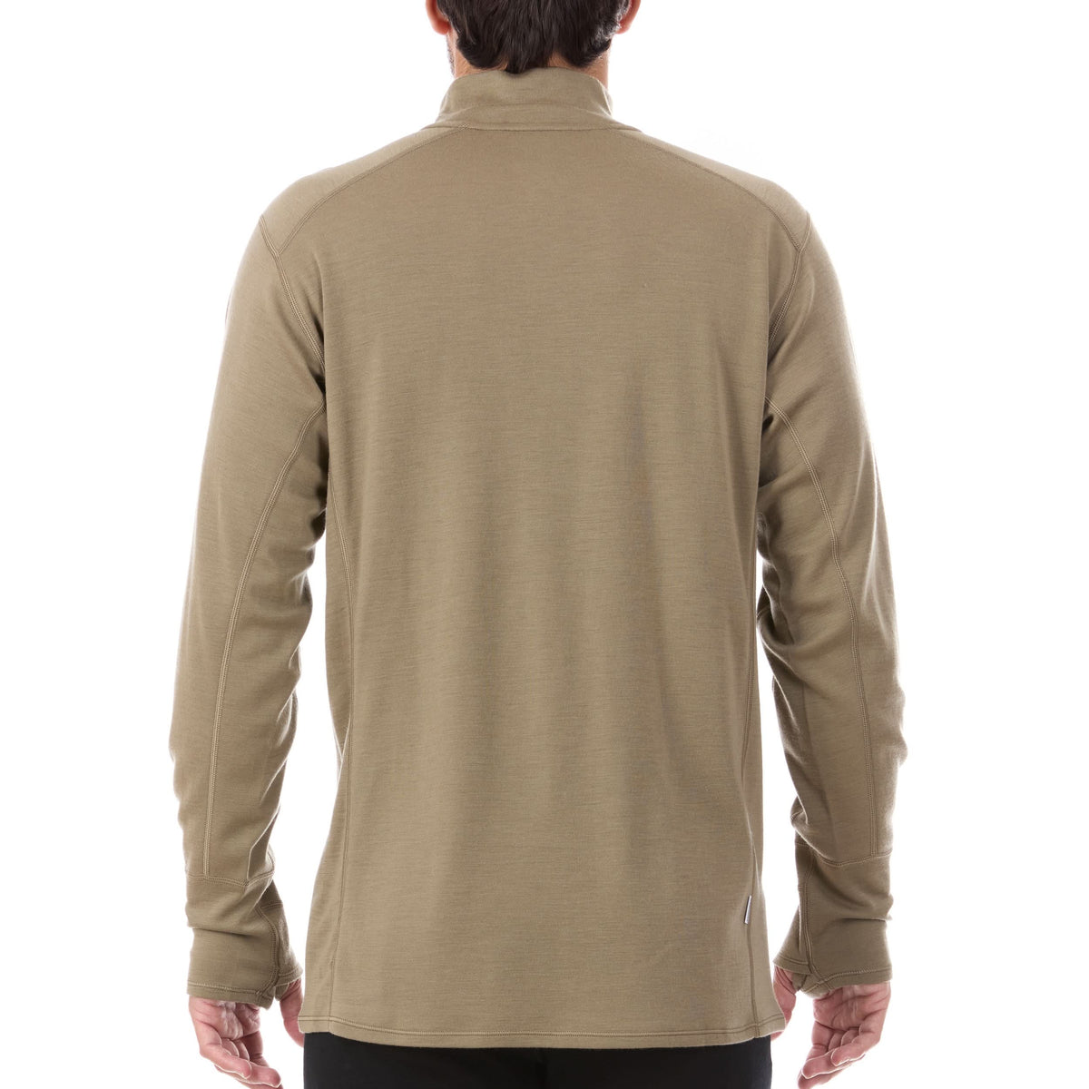 A man models the merino wool midweight quarter zip sweater, complete with flat-lock seams and thumbholes.