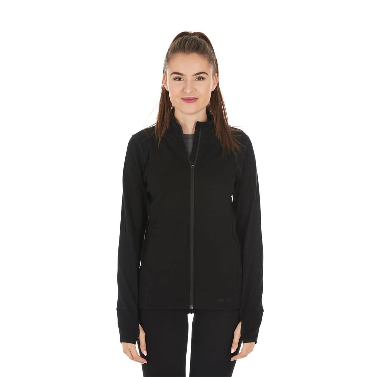 A woman models a hundred percent merino wool heavyweight full zip sweater. This outer layer features a two and a half inch mock neck collar, two zippered pockets, and thumbholes.