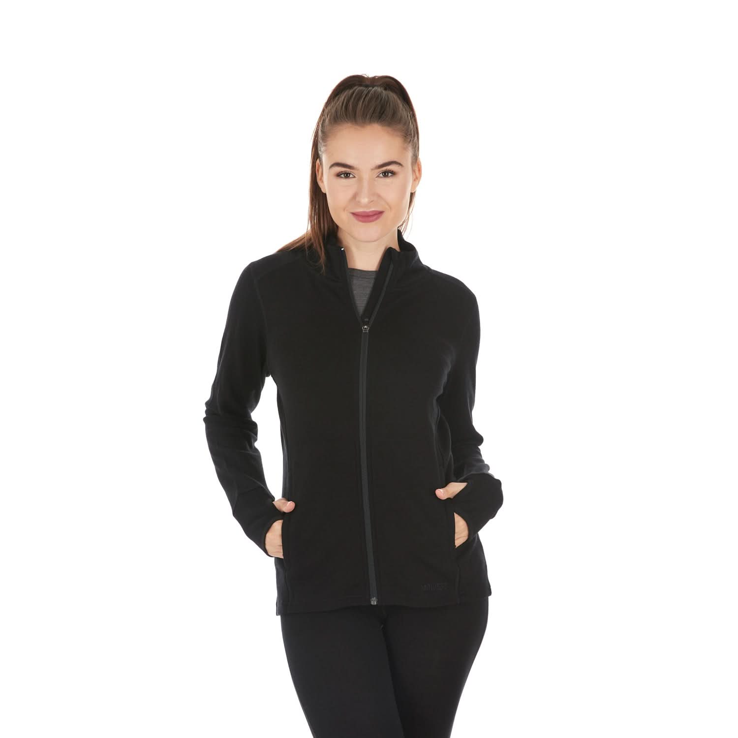 Woman modeling a heavyweight full-zip merino wool sweater, front view with hands in pockets
