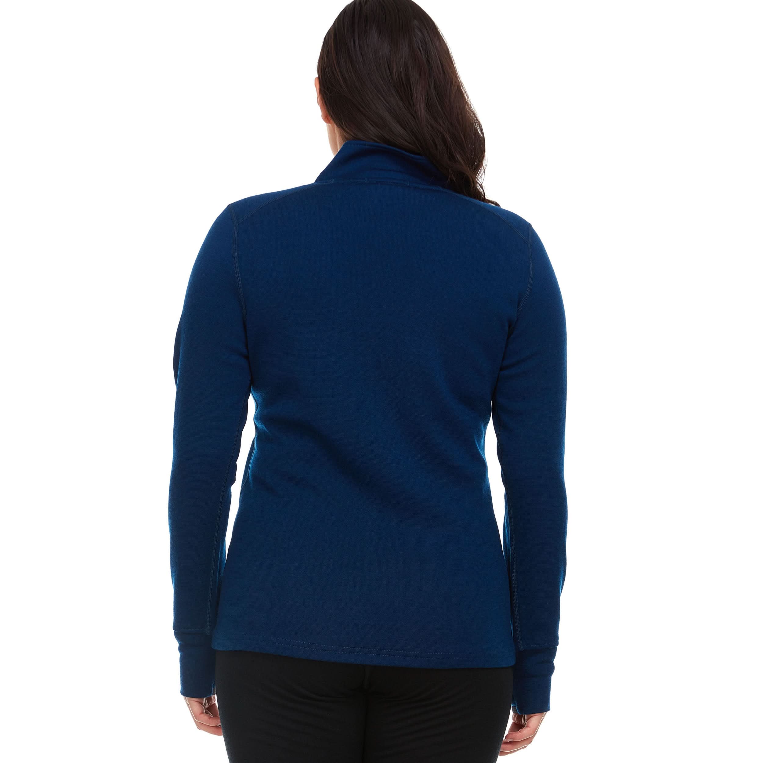 A woman models a hundred percent merino wool heavyweight full zip sweater. This outer layer features a two and a half inch mock neck collar, two zippered pockets, and thumbholes. Back view.