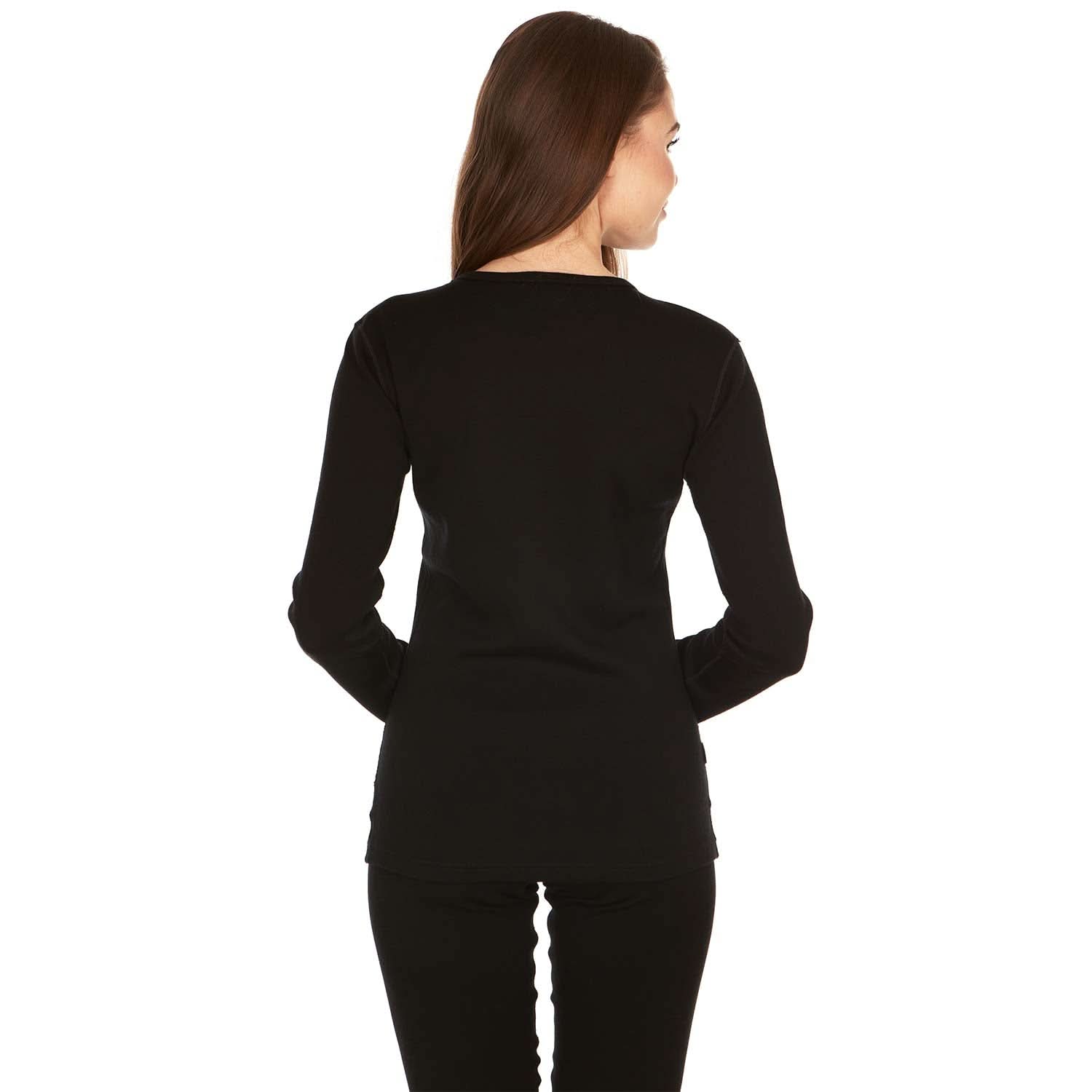 A woman models the one hundred percent merino wool heavyweight women's base layer crew top. This super soft top has a princess cut style for a more flattering fit., back view