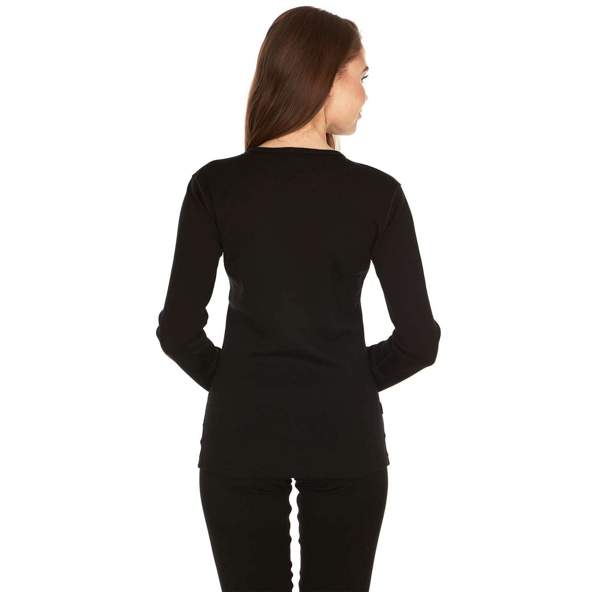 A woman models the one hundred percent merino wool heavyweight women's base layer crew top. This super soft top has a princess cut style for a more flattering fit., back view