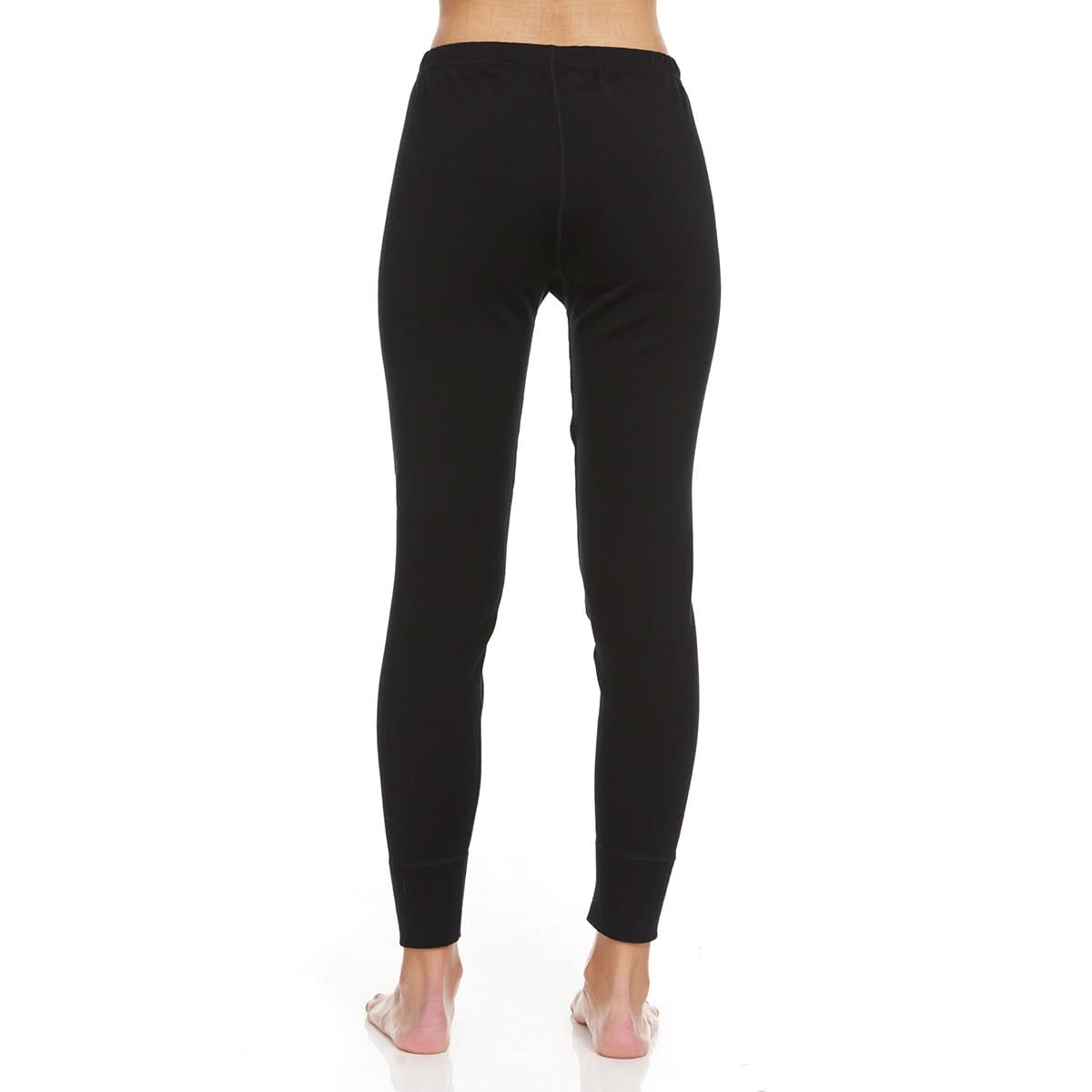 A pair of one hundred percent merino wool heavyweight women's base layer bottoms. These bottoms feature a gusset between the legs for improved range of motion, and cuffs around the ankles for comfort and style. Back view.