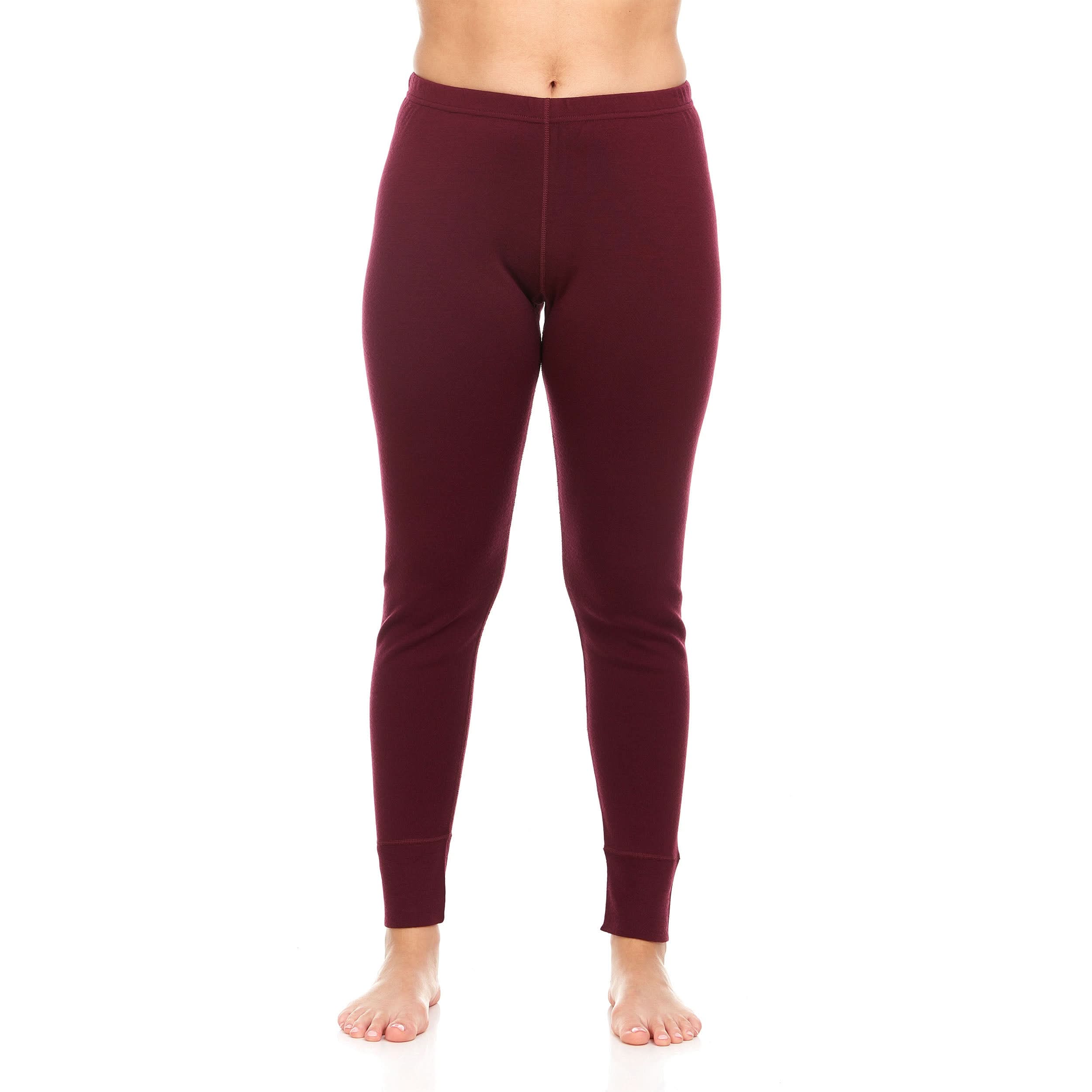 A pair of one hundred percent merino wool heavyweight women's base layer bottoms. These bottoms feature a gusset between the legs for improved range of motion, and cuffs around the ankles for comfort and style, front view