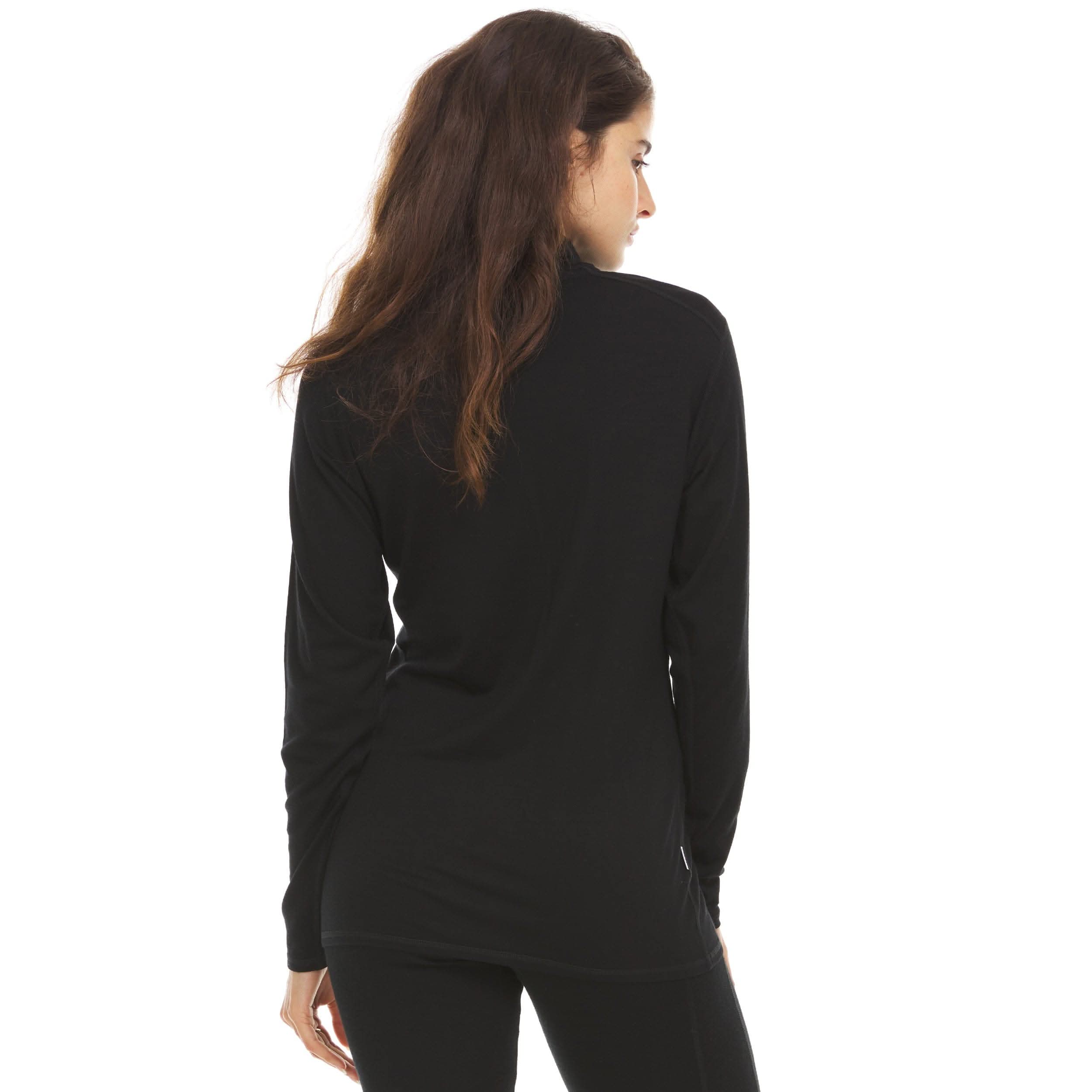 Back view of a woman wearing a black micro weight merino wool quarter-zip top, showing the stand collar, shoulder seams, fitted long sleeves, straight back panel, and hip-length hem