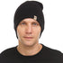 A man models a heavyweight, super soft, one hundred percent merino wool beanie. This heavyweight beanie is the warmest hat that we offer, perfect for hiking through the White Mountains, or sitting at a bonfire in January, front view