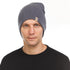 A man models a heavyweight, super soft, one hundred percent merino wool beanie. This heavyweight beanie is the warmest hat that we offer, perfect for hiking through the White Mountains, or sitting at a bonfire in January, front view