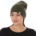 A woman models a heavyweight, super soft, one hundred percent merino wool beanie. This heavyweight beanie is the warmest hat that we offer, perfect for hiking through the White Mountains, or sitting at a bonfire in January, front view