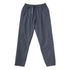 A pair of dark slate gray relaxed-fit pants with an elastic waistband, side pockets, and a small gray hanging tag, shown against a plain white background.