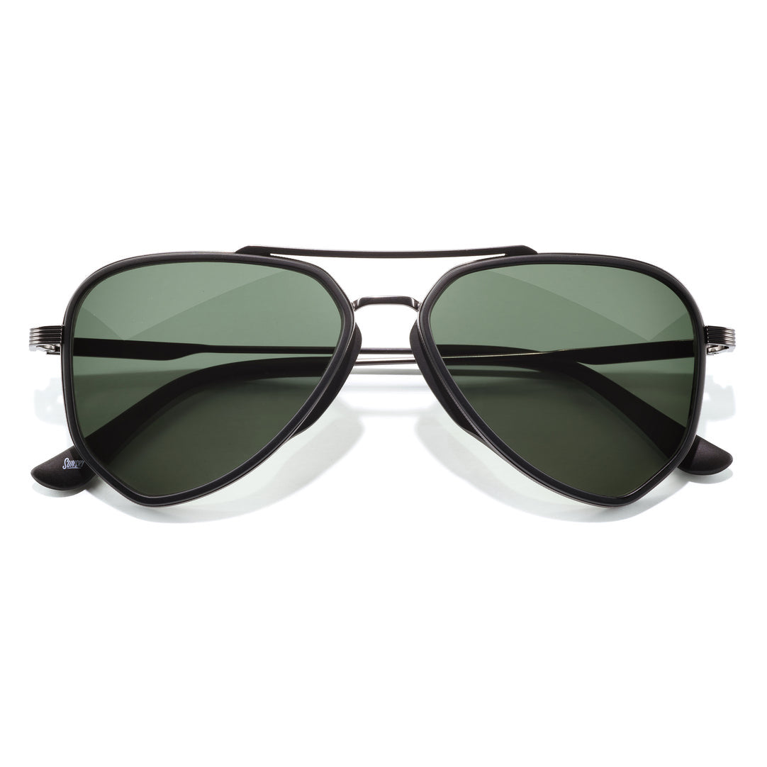 Sunski Astra Polarized Sunglasses - Black Forest - Aviator sunglasses with black frame and green lenses on a white background