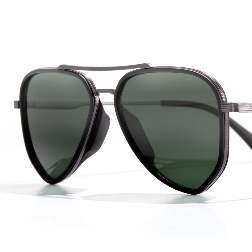 Sunski Astra Polarized Sunglasses - Black Forest - Sunglasses with dark lenses and thin metal frame on a white background